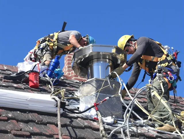 Protective chimney cap installed by Newtown Chimney Sweep in Newtown, CT