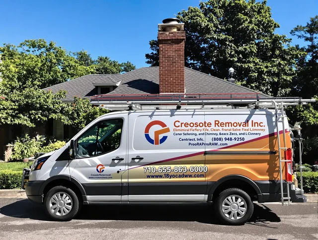 Newtown Chimney Sweep technician removing creosote safely in Newtown, CT